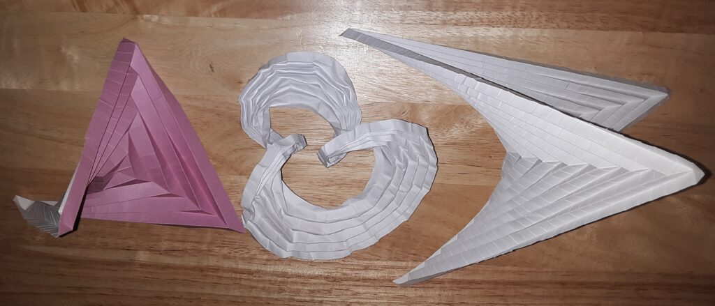 Creasing Paper, Making Magic: Exploring Hyperbolic Paraboloids